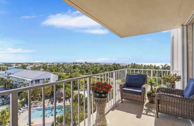2000 Coco Plum Drive, Unit 603 Marathon, FL 33050 - Photo 2 of 22 a view of a balcony with furniture