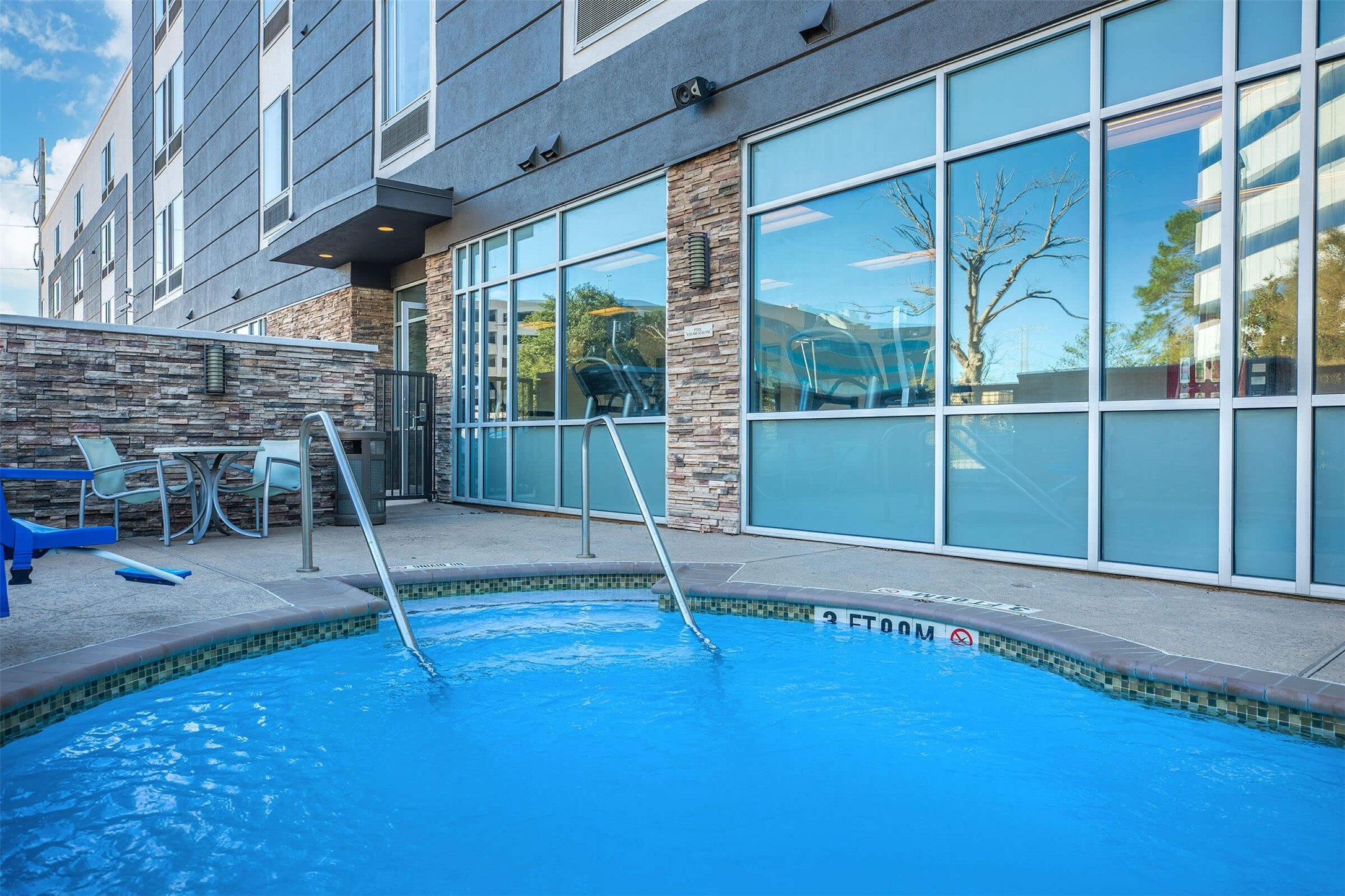 1350 Broadfield Boulevard, Unit 321 Houston, TX 77084 - Photo 24 of 29 a room with lots of windows