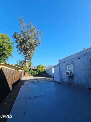 a view of a yard with an outdoor space