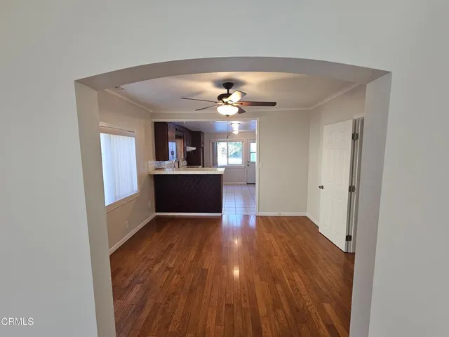 a room with a sink and a mirror