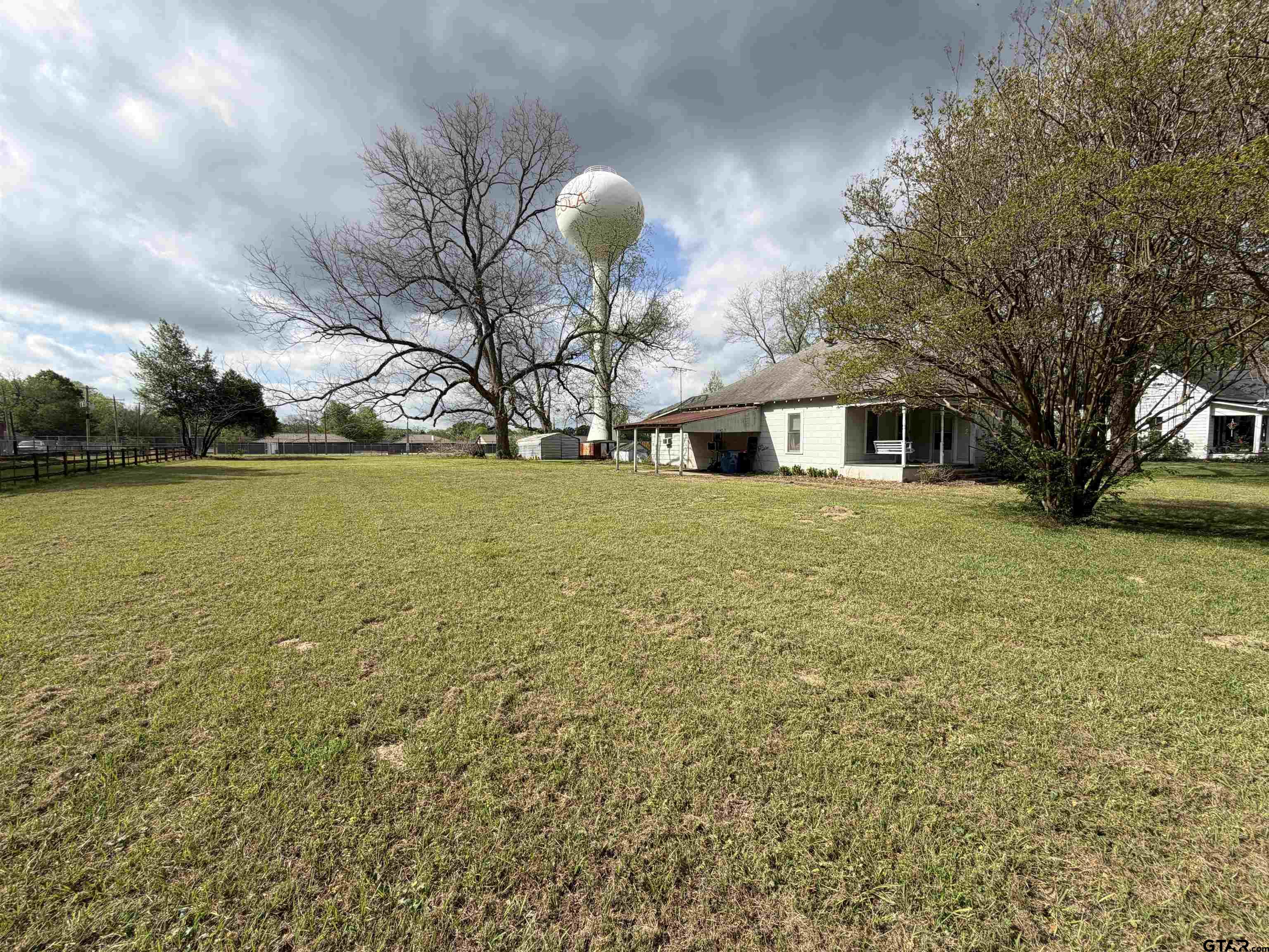 609 Walnut Mineola, TX 75773 - Photo 23 of 23 a view of a house with a yard