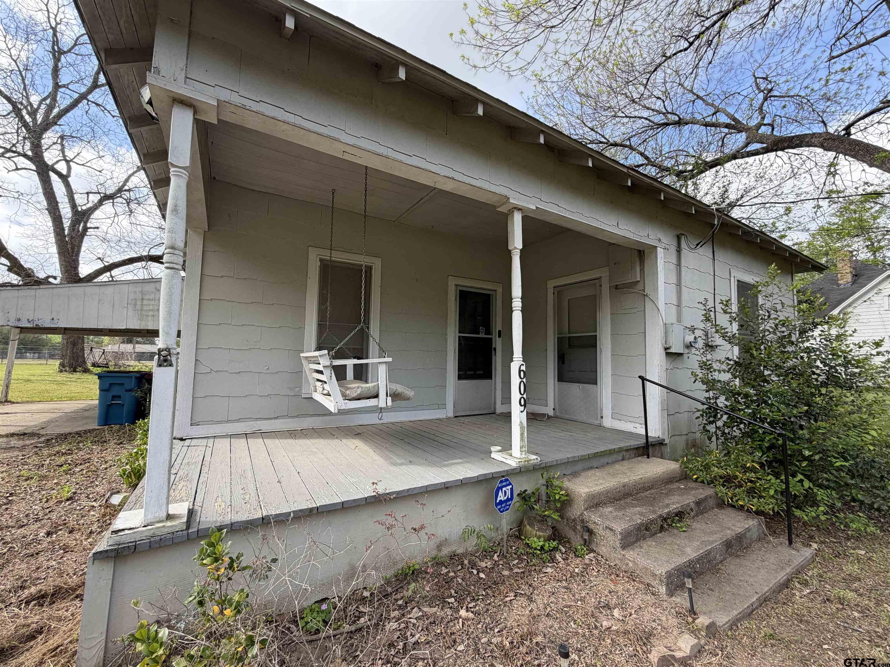 609 Walnut Mineola, TX 75773 - Photo 3 of 23 a view of a house with a patio