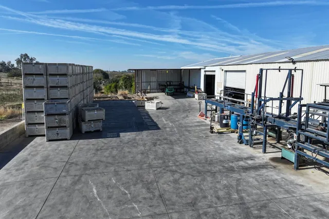 a view of a chairs and table in the patio