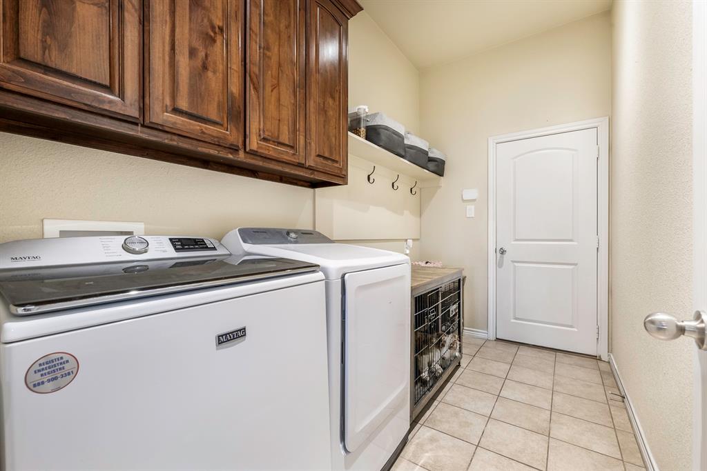 103 Brandy Lane Stephenville, TX 76401 - Photo 24 of 37 a utility room with dryer and washer