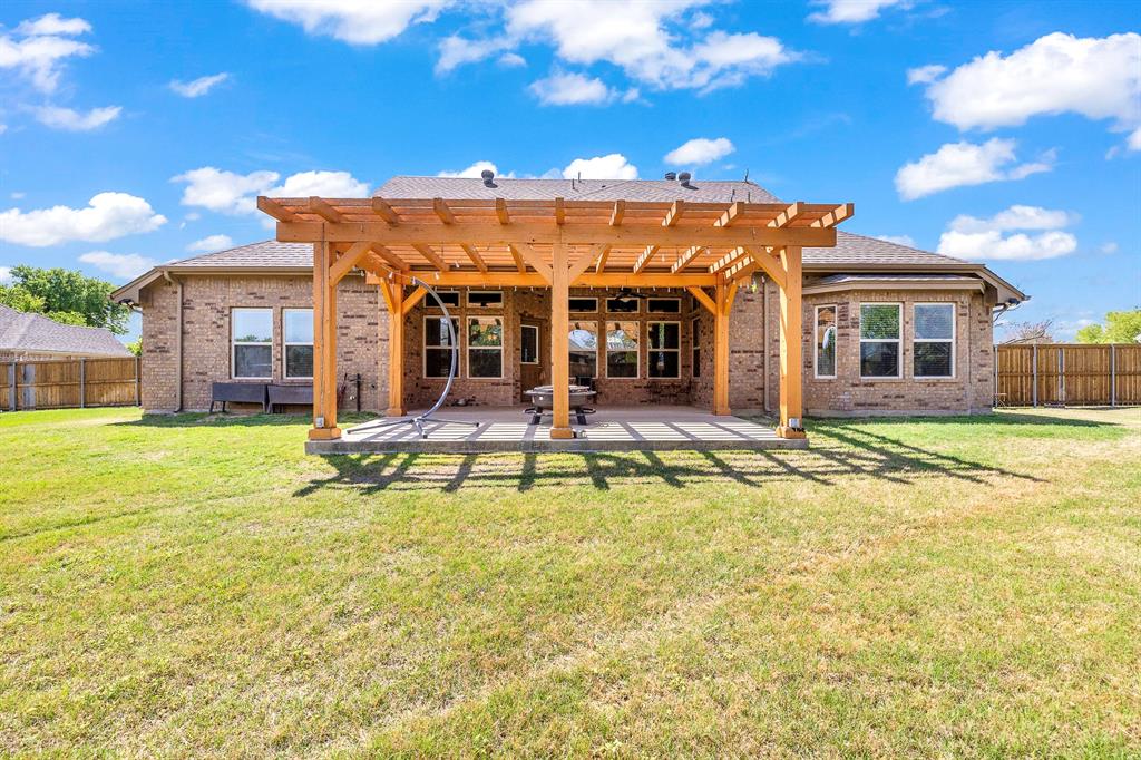 103 Brandy Lane Stephenville, TX 76401 - Photo 37 of 37 a view of a house with swimming pool and a large tree