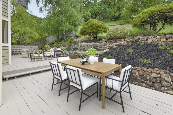 a view of a chairs and table in the outdoor