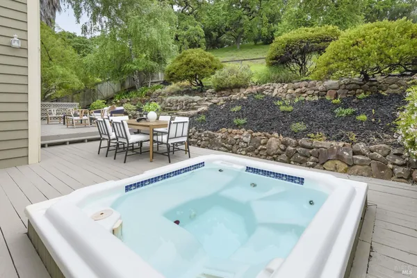 a backyard of a house with seating space