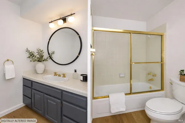 a view of a livingroom with furniture and a hallway