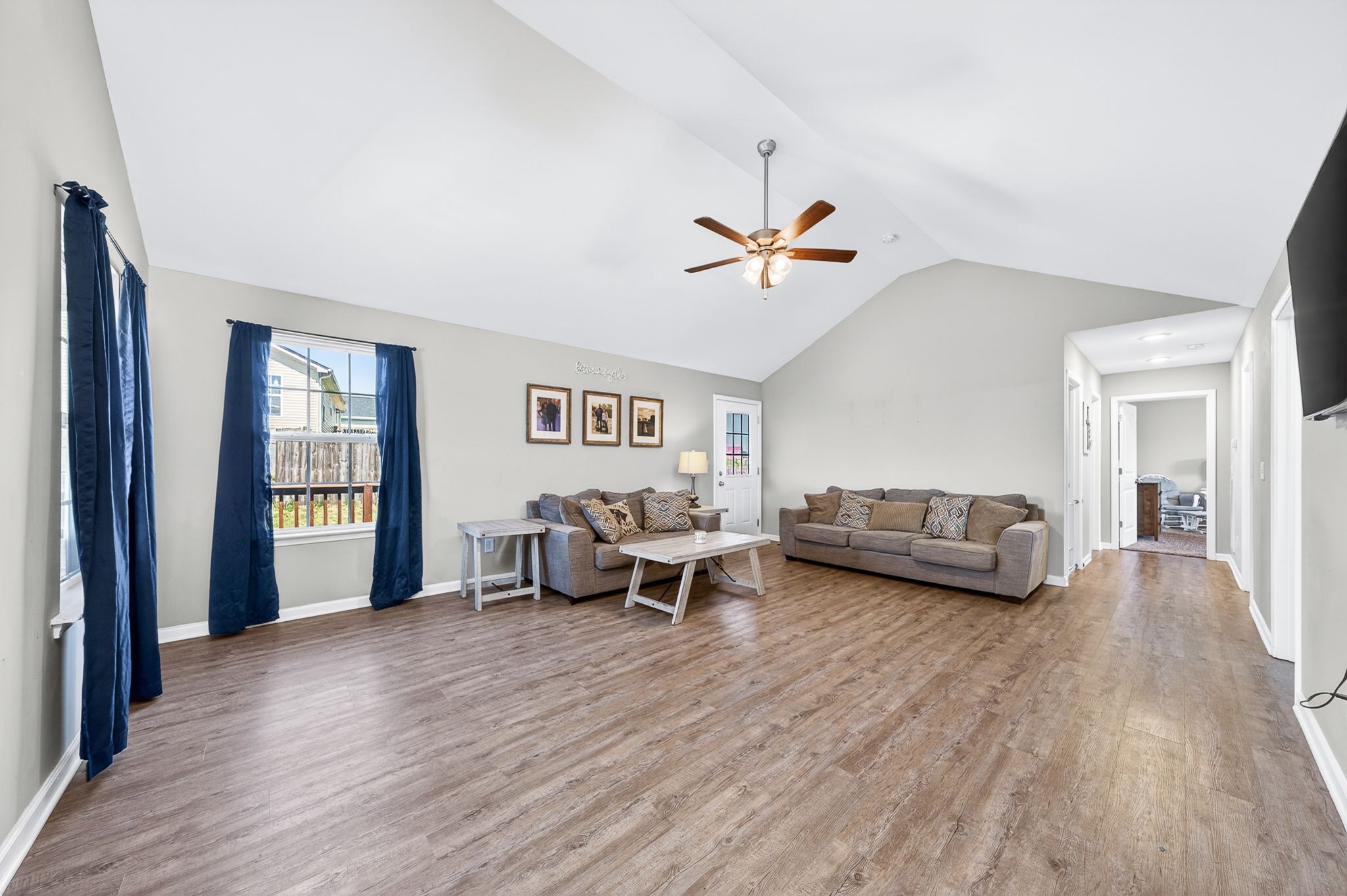 144 Liberty Road Sparta, TN 38583 - Photo 3 of 24 a view of a livingroom with furniture and a ceiling fan