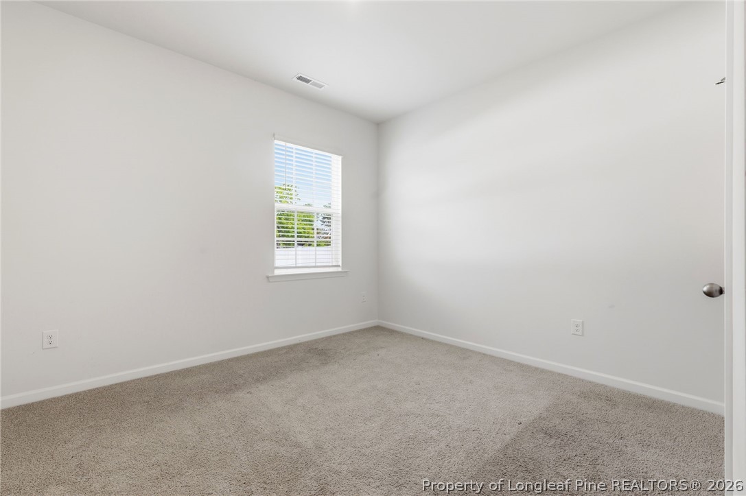 2208 Clydesmill Road Fayetteville, NC 28314 - Photo 17 of 26 an empty room with a window