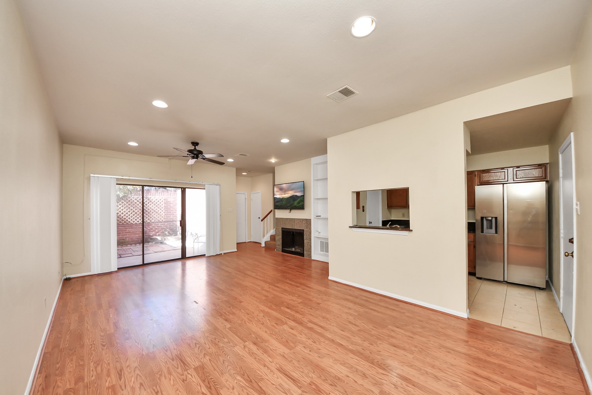 7447 Cambridge Street, Unit 106 Houston, TX 77054 - Photo 20 of 40 a view of a kitchen with a sink and a stove top oven