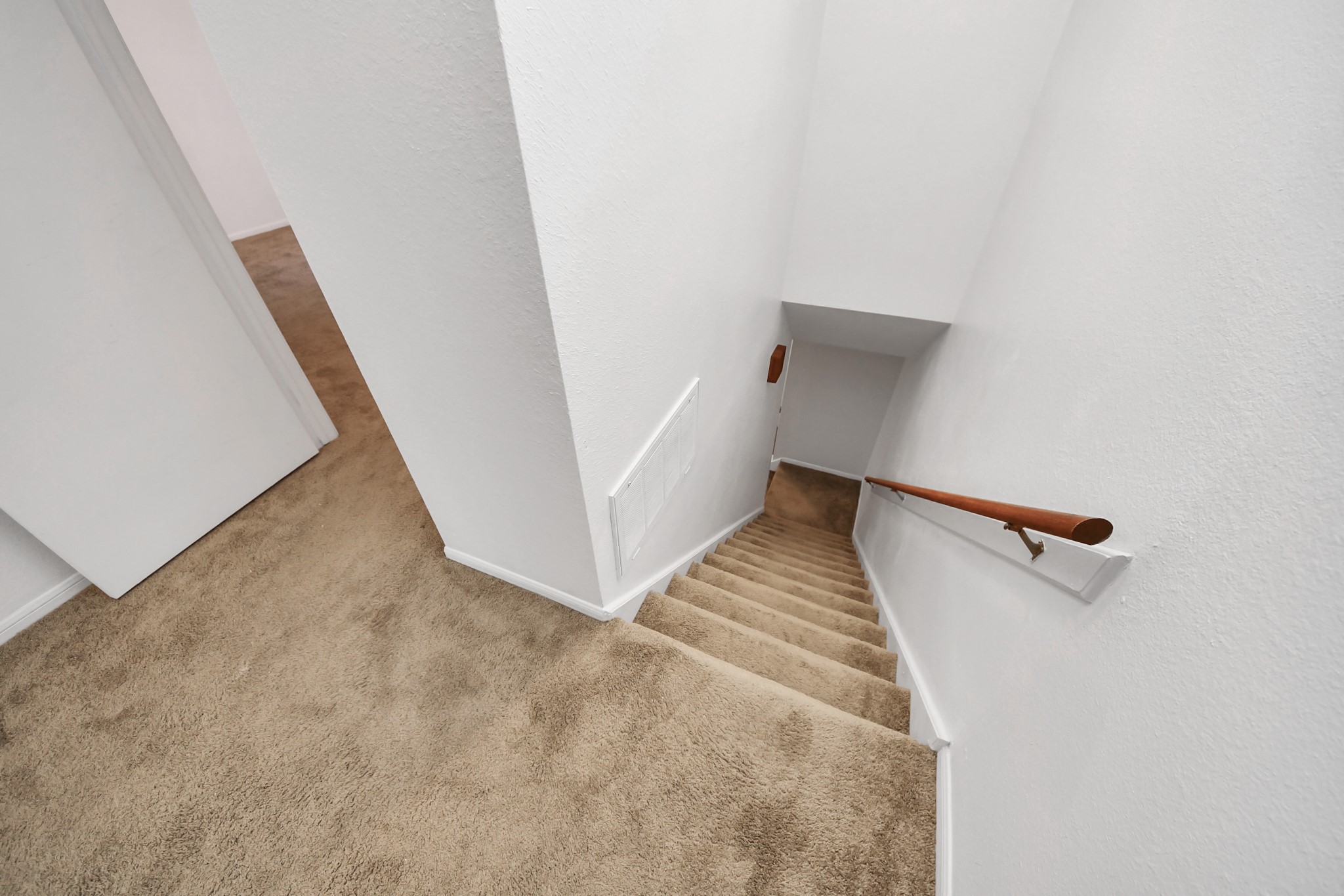 7447 Cambridge Street, Unit 106 Houston, TX 77054 - Photo 22 of 40 a view of a hallway with staircase