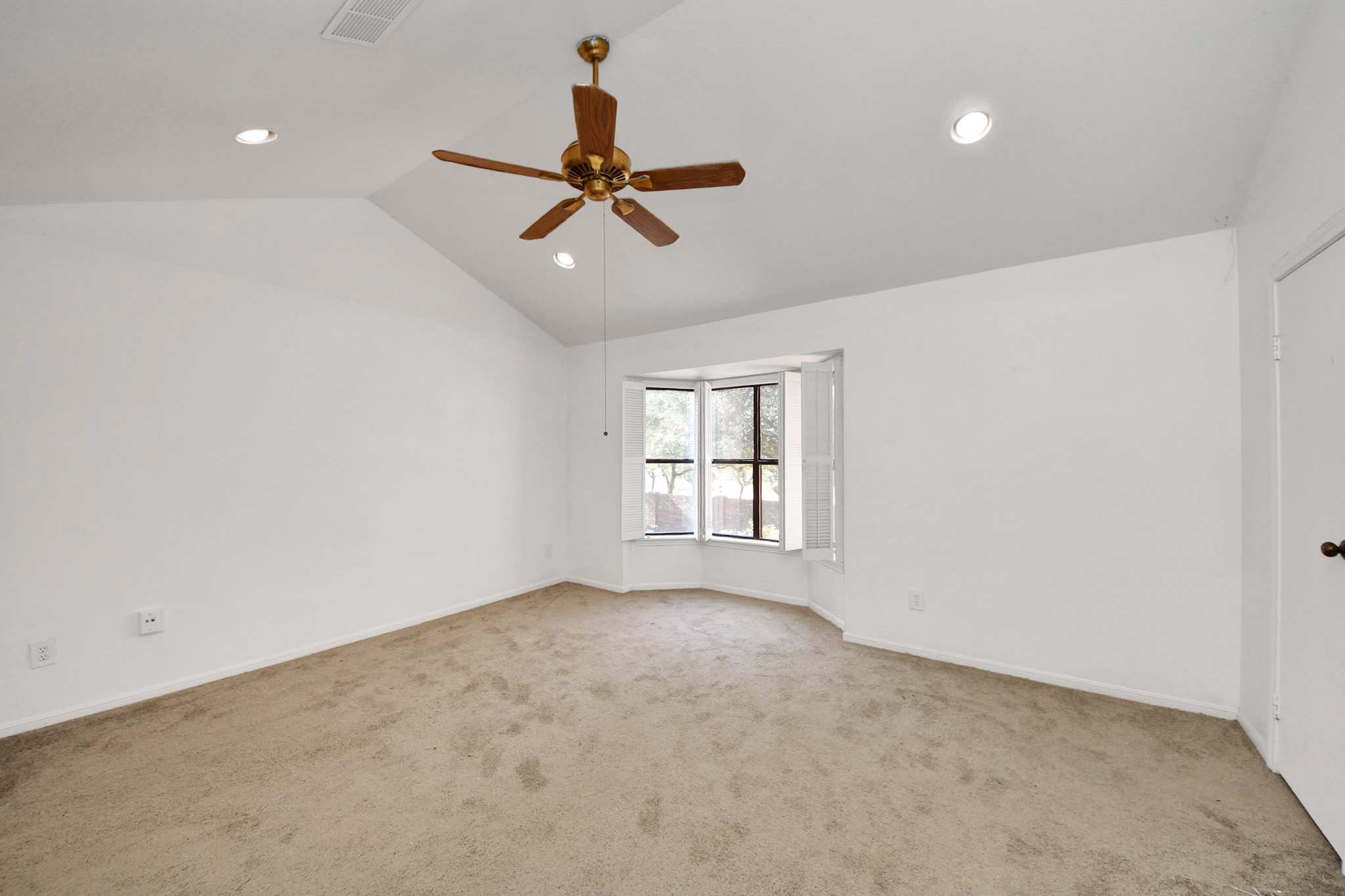 7447 Cambridge Street, Unit 106 Houston, TX 77054 - Photo 25 of 40 a view of empty room with windows