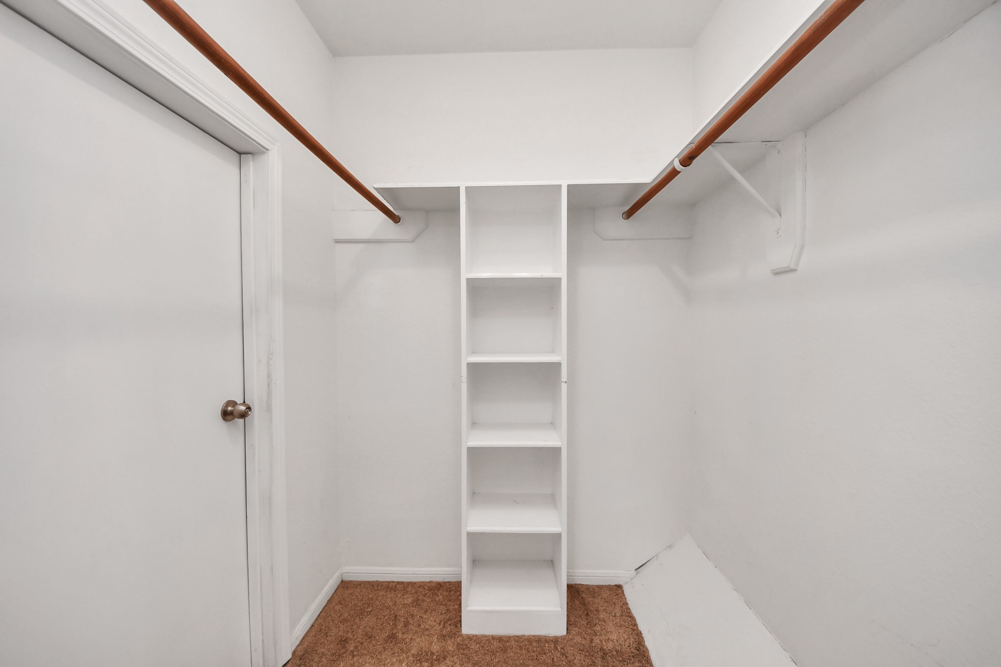 7447 Cambridge Street, Unit 106 Houston, TX 77054 - Photo 28 of 40 a view of an empty walk in closet