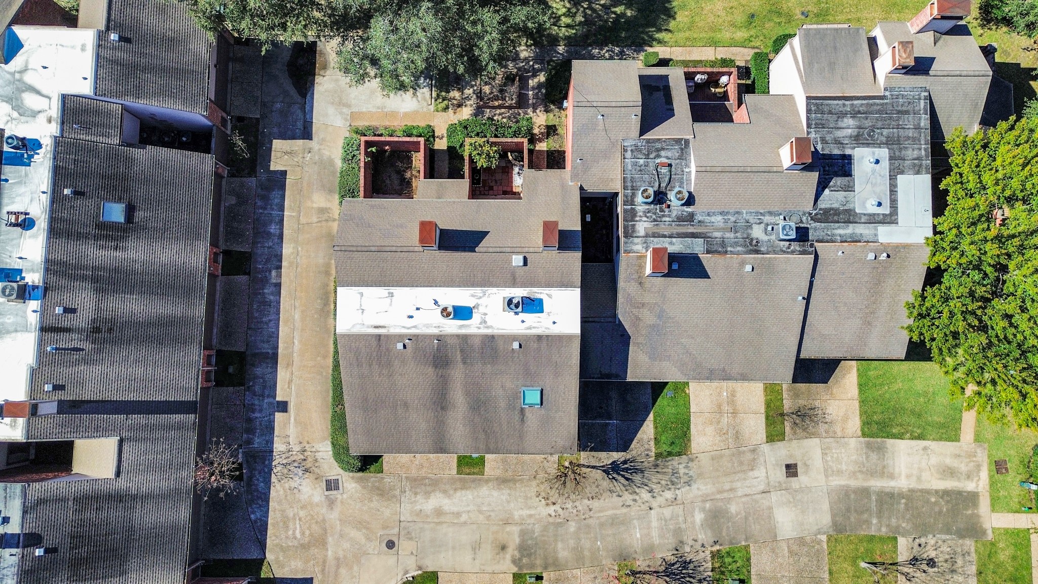 7447 Cambridge Street, Unit 106 Houston, TX 77054 - Photo 3 of 40 a aerial view of residential houses with outdoor space