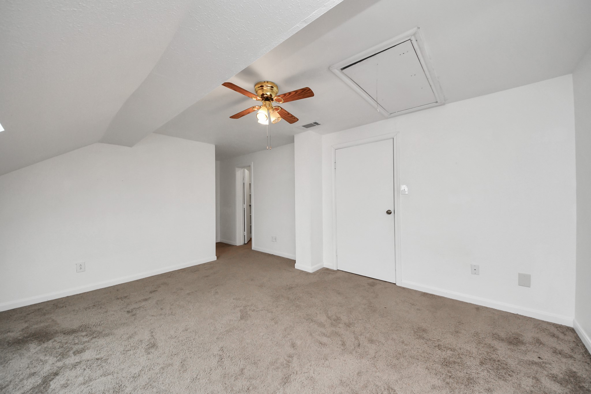 7447 Cambridge Street, Unit 106 Houston, TX 77054 - Photo 34 of 40 a view of a livingroom with a ceiling fan and window