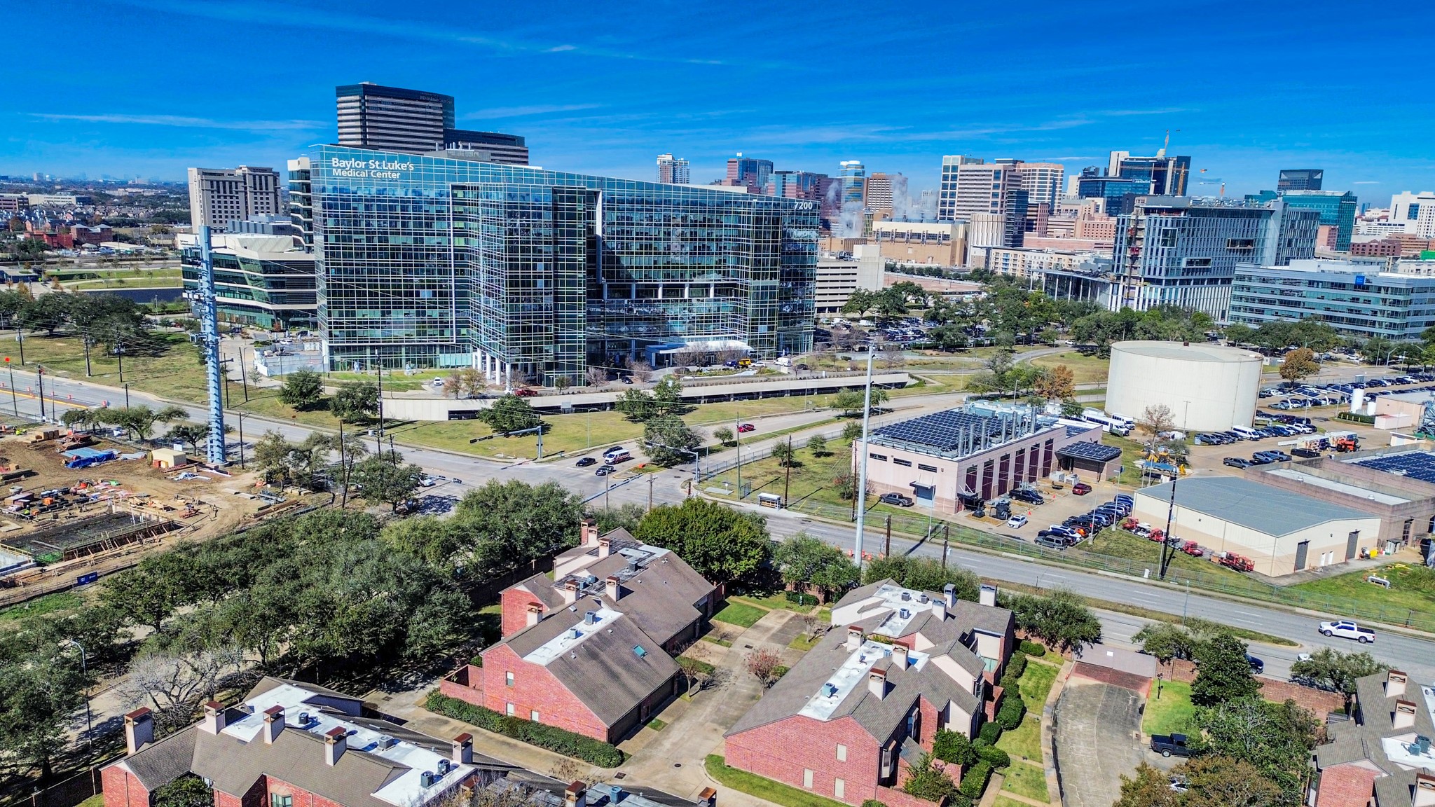 7447 Cambridge Street, Unit 106 Houston, TX 77054 - Photo 6 of 40 a view of a city with tall buildings