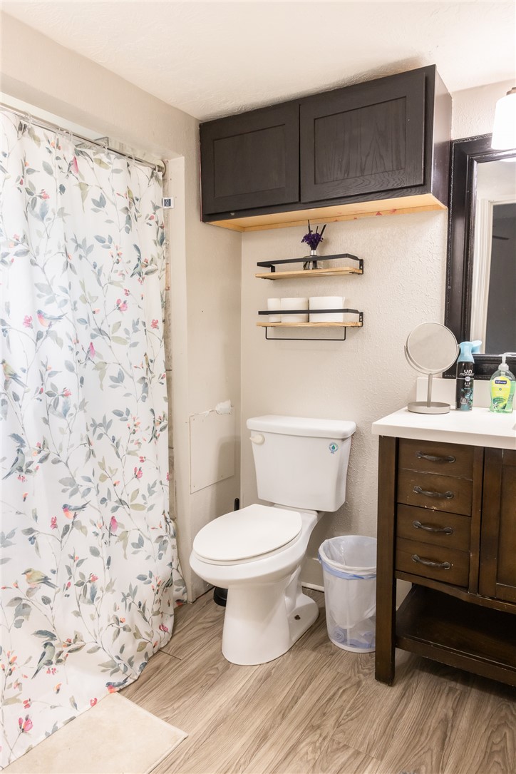 1902 Miller Avenue Bryan, TX 77801 - Photo 15 of 45 a bathroom with a sink toilet and shower