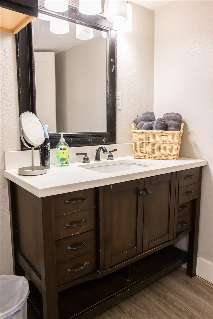 1902 Miller Avenue Bryan, TX 77801 - Photo 16 of 45 a bathroom with a sink vanity and a mirror