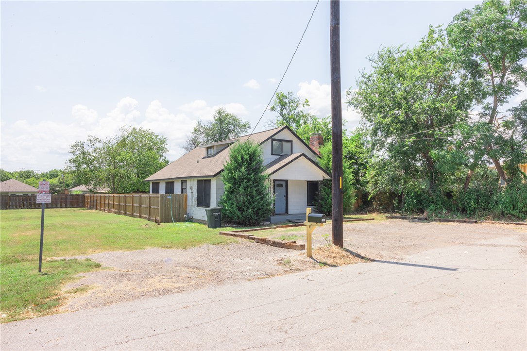 1902 Miller Avenue Bryan, TX 77801 - Photo 2 of 45 a view of a house with a backyard