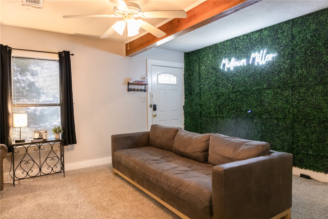 1902 Miller Avenue Bryan, TX 77801 - Photo 3 of 45 a living room with furniture and a flat screen tv