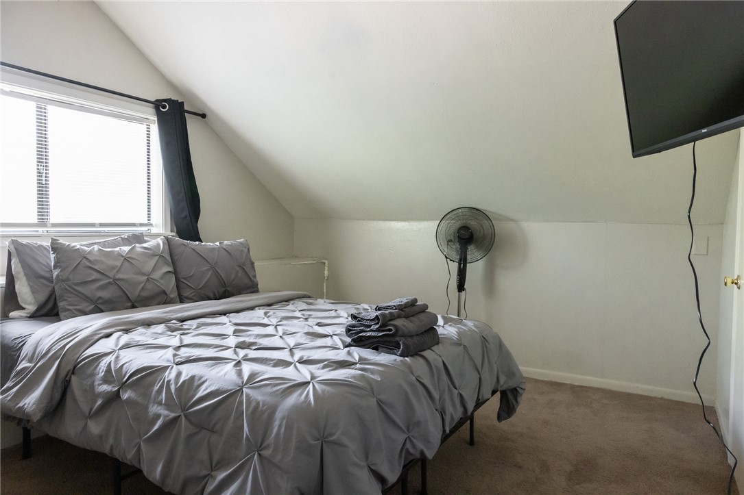 1902 Miller Avenue Bryan, TX 77801 - Photo 32 of 45 a bedroom with a bed and a window