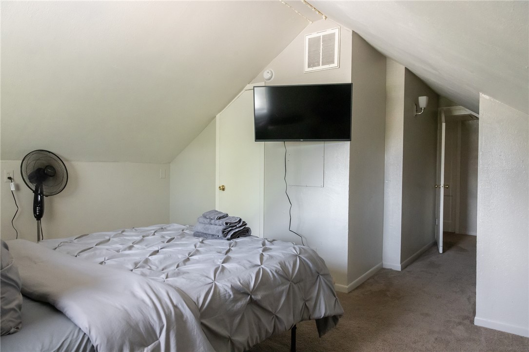 1902 Miller Avenue Bryan, TX 77801 - Photo 33 of 45 a bedroom with a bed and a television