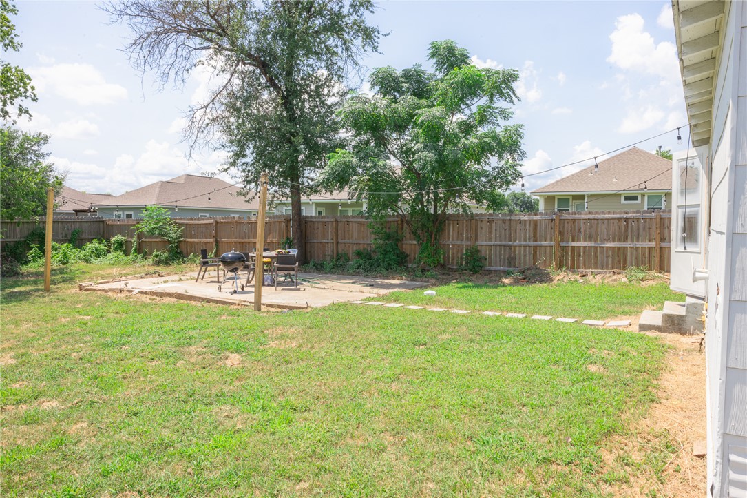 1902 Miller Avenue Bryan, TX 77801 - Photo 38 of 45 a swimming pool with outdoor seating and yard