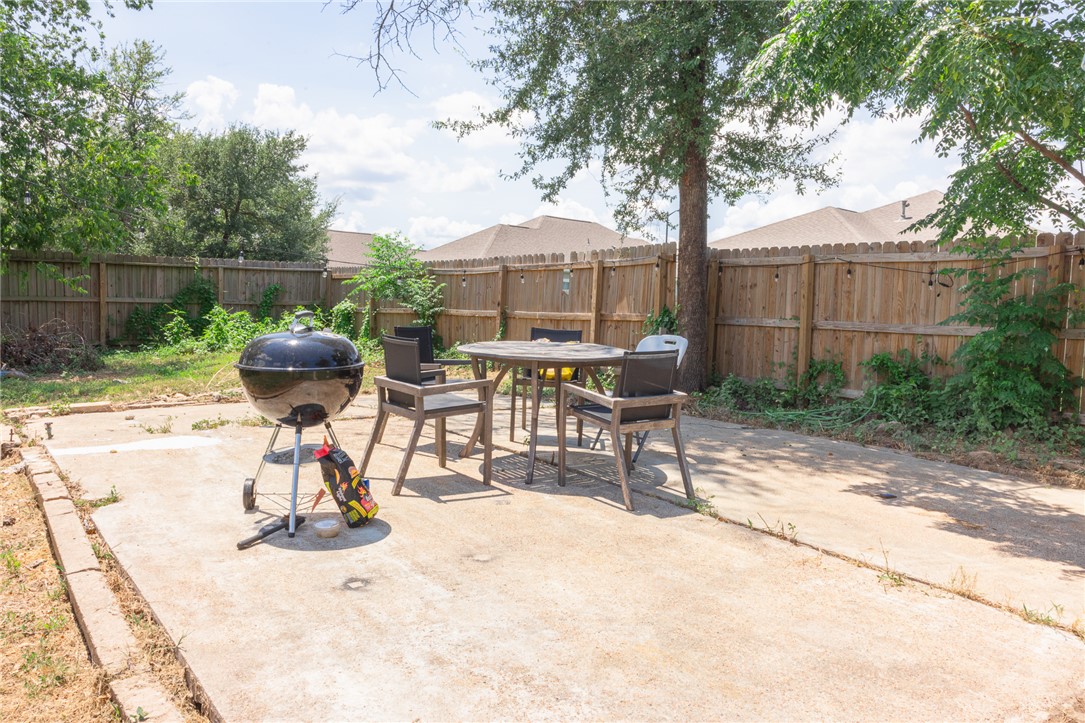 1902 Miller Avenue Bryan, TX 77801 - Photo 39 of 45 a view of a backyard with sitting area and furniture