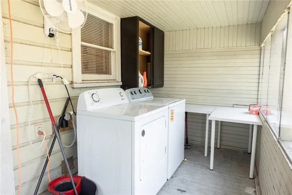 a utility room with dryer and washer