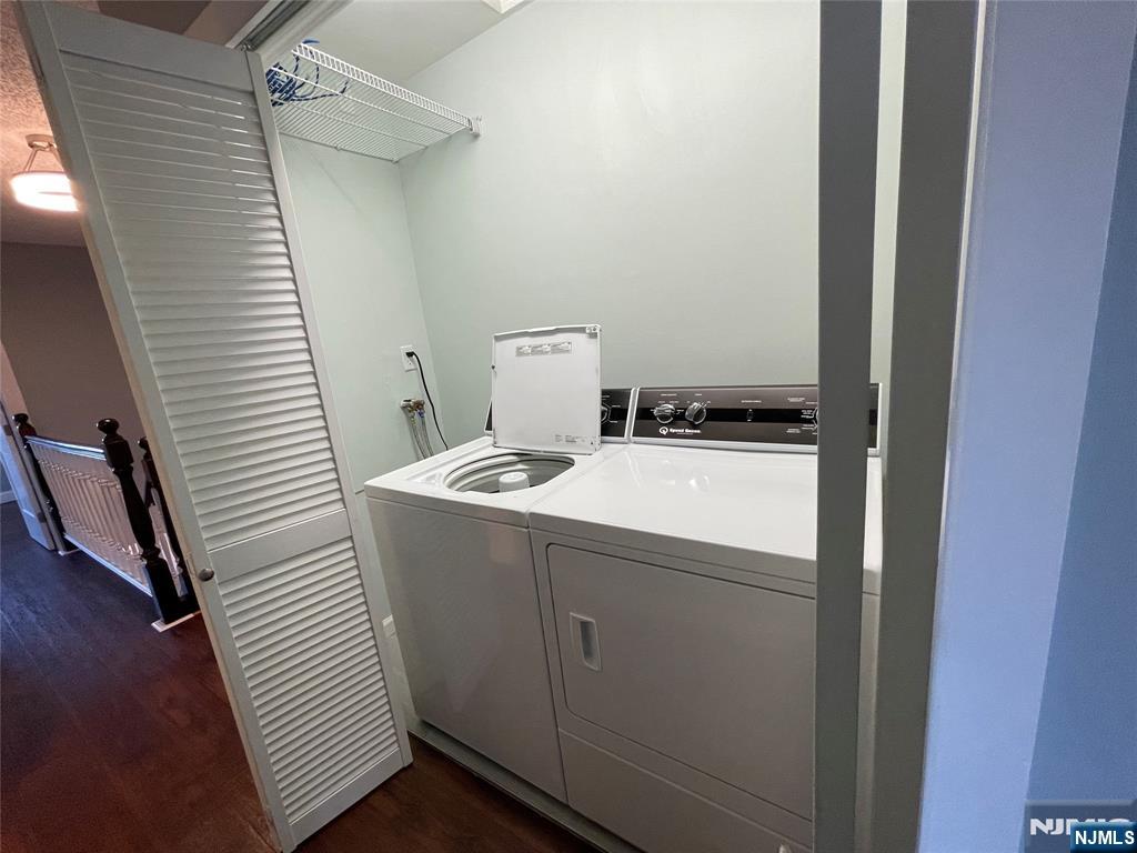 52 Reilly Court, Unit 1 Hackensack, NJ 07601 - Photo 16 of 25 a utility room with dryer and washer