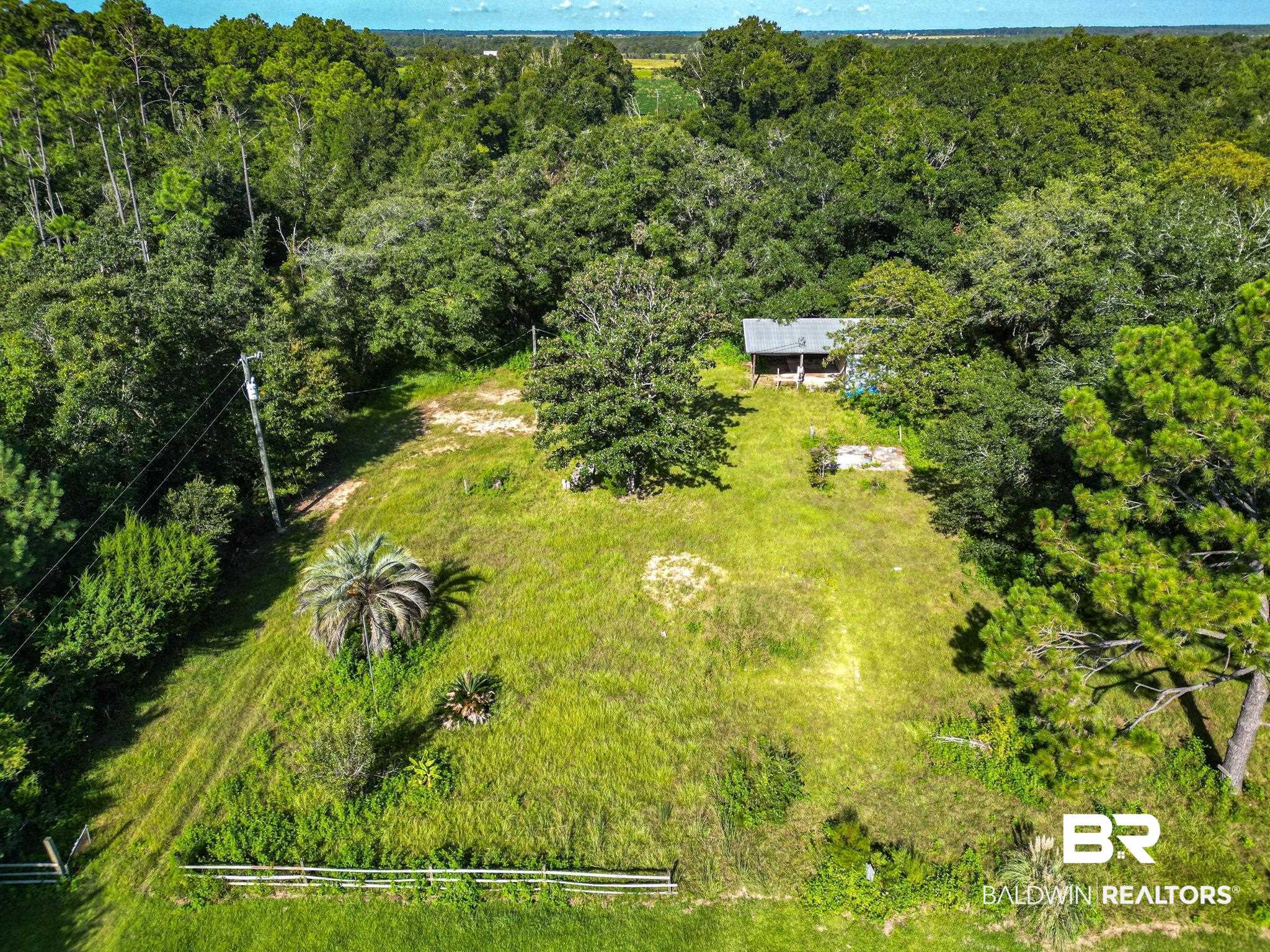 32429 Jay Kee Lane Elberta, AL 36530 - Photo 6 of 13 View of subject property featuring a heavily wooded area