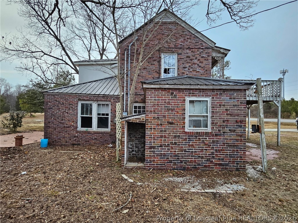 1737 West Carthage Road Lumberton, NC 28360 - Photo 23 of 39 a front view of a house with garden