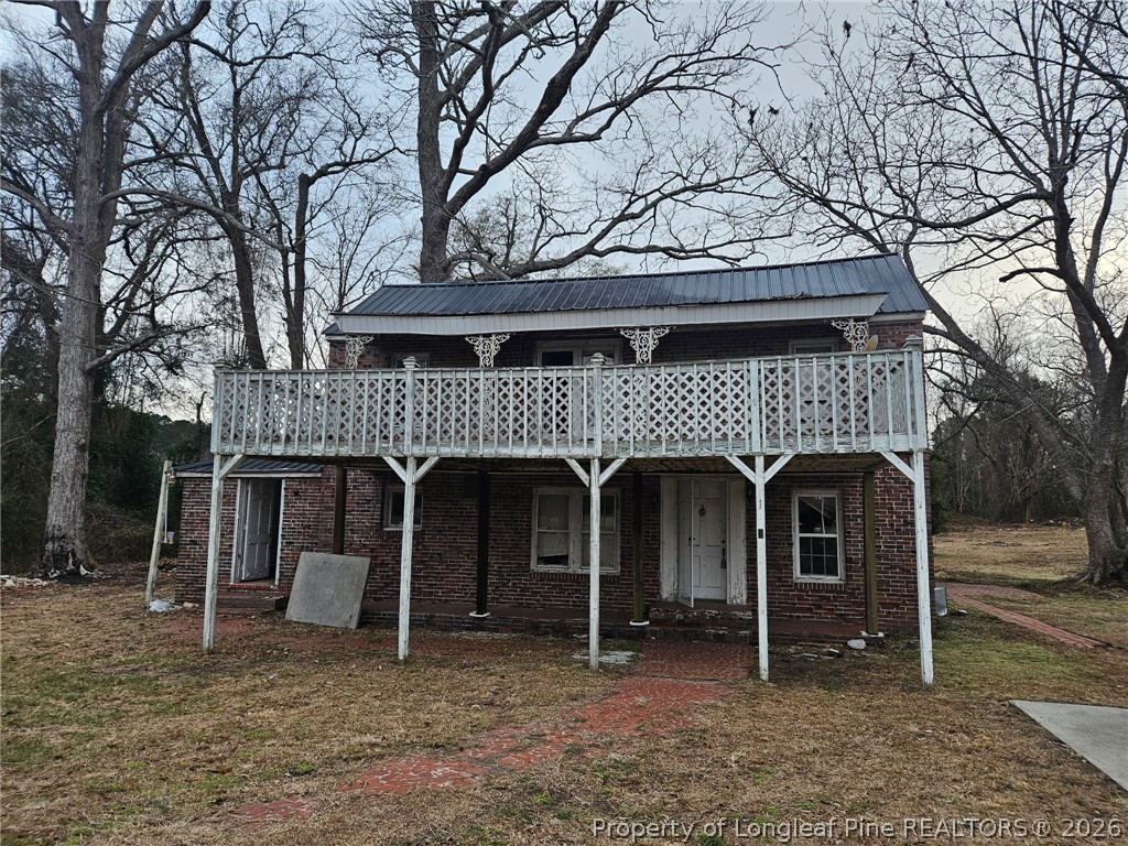 1737 West Carthage Road Lumberton, NC 28360 - Photo 26 of 39 a front view of a house with garden