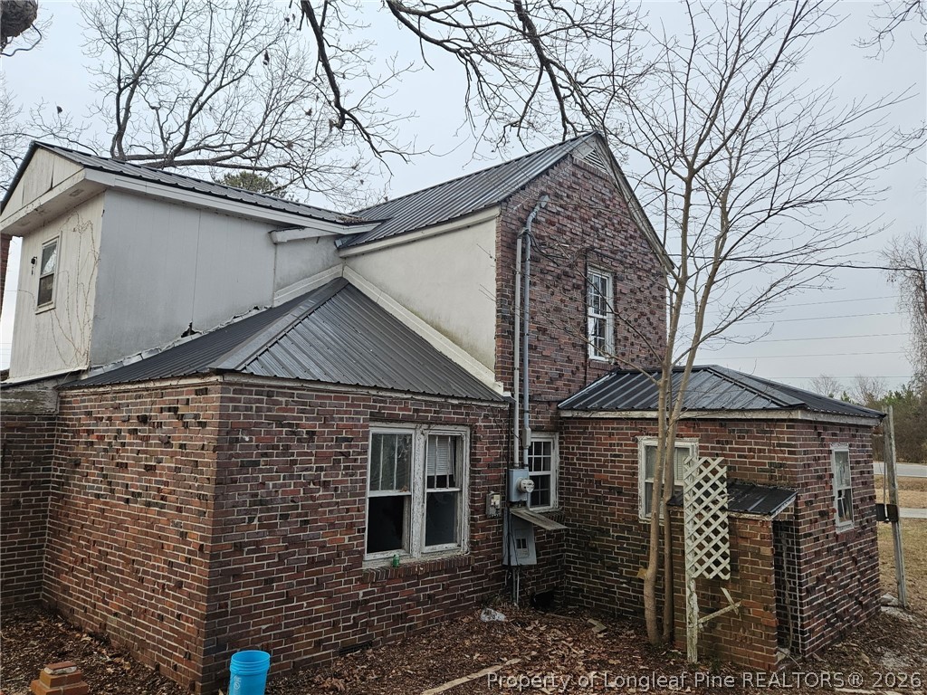 1737 West Carthage Road Lumberton, NC 28360 - Photo 28 of 39 a front view of a house with parking space