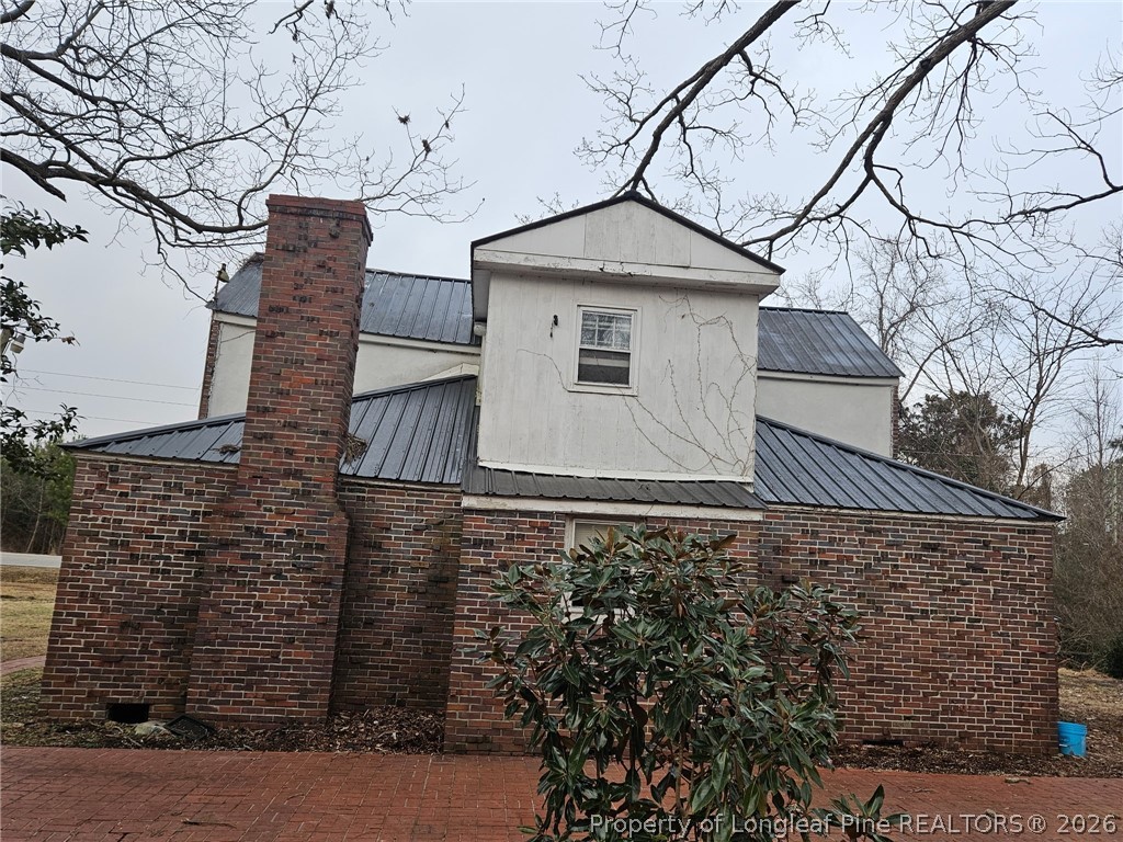 1737 West Carthage Road Lumberton, NC 28360 - Photo 38 of 39 a view of a house with a yard