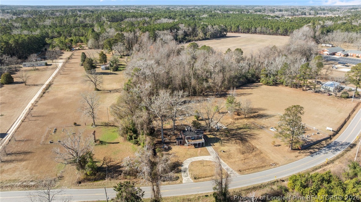 1737 West Carthage Road Lumberton, NC 28360 - Photo 10 of 39 a view of a yard with wooden fence
