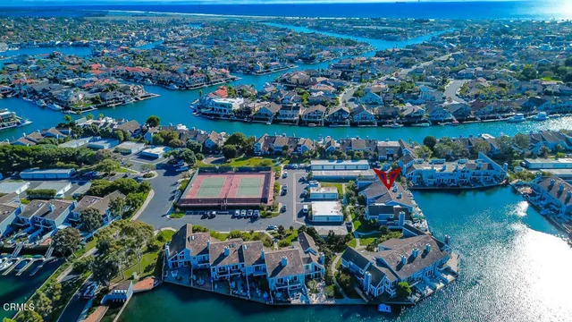 an aerial view of a houses with outdoor space