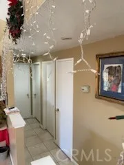 a bathroom with a shower a sink and a mirror