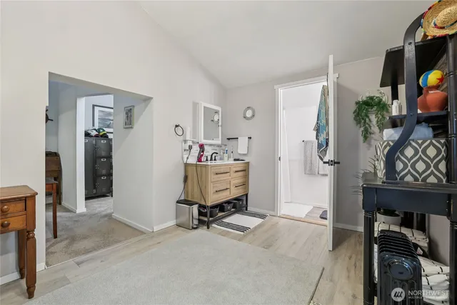 a view of room with furniture and closet