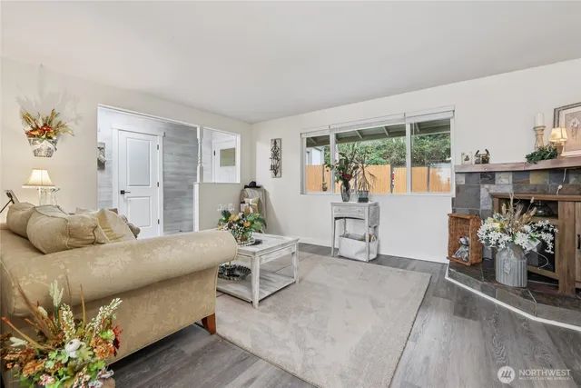 a bedroom with furniture and a window