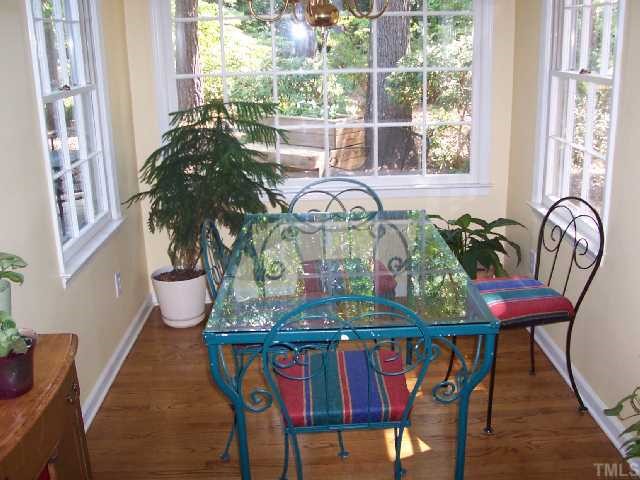 5612 Alpine Drive Raleigh, NC 27609 - Photo 4 of 10 a view of a dining room with furniture window and outside view