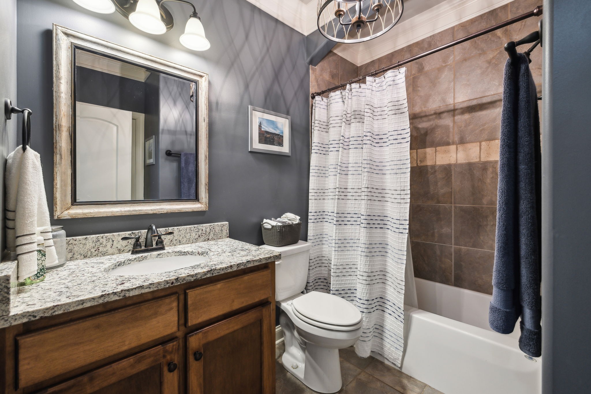7023 Brindle Ridge Way Spring Hill, TN 37174 - Photo 14 of 26 a bathroom with a granite countertop sink toilet and shower