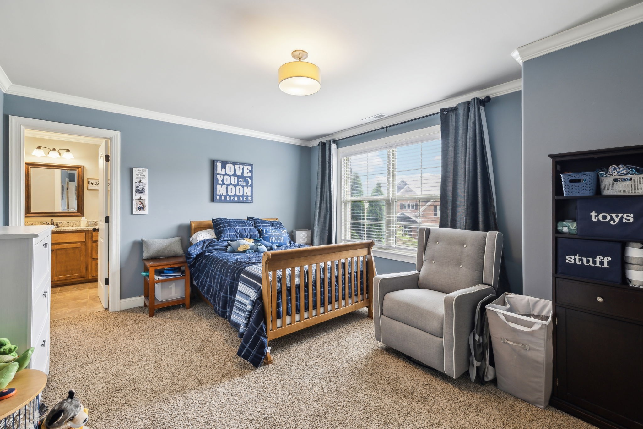 7023 Brindle Ridge Way Spring Hill, TN 37174 - Photo 19 of 26 a bedroom with furniture and a large window