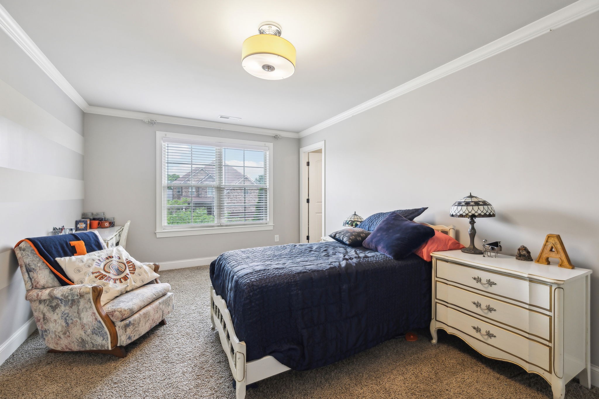 7023 Brindle Ridge Way Spring Hill, TN 37174 - Photo 21 of 26 a bed room with a bed and a window