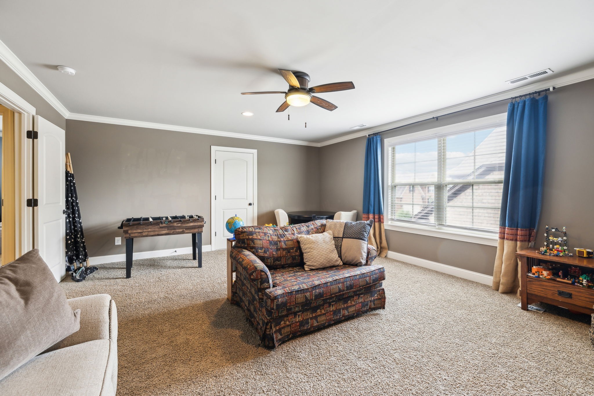 7023 Brindle Ridge Way Spring Hill, TN 37174 - Photo 22 of 26 a living room with furniture and a window