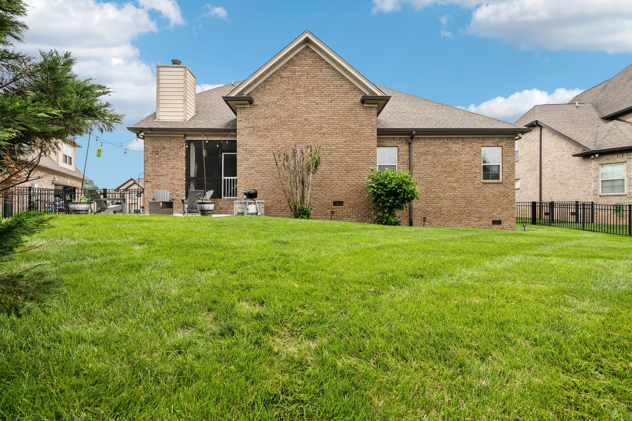 7023 Brindle Ridge Way Spring Hill, TN 37174 - Photo 26 of 26 a front view of a house with a yard and garage
