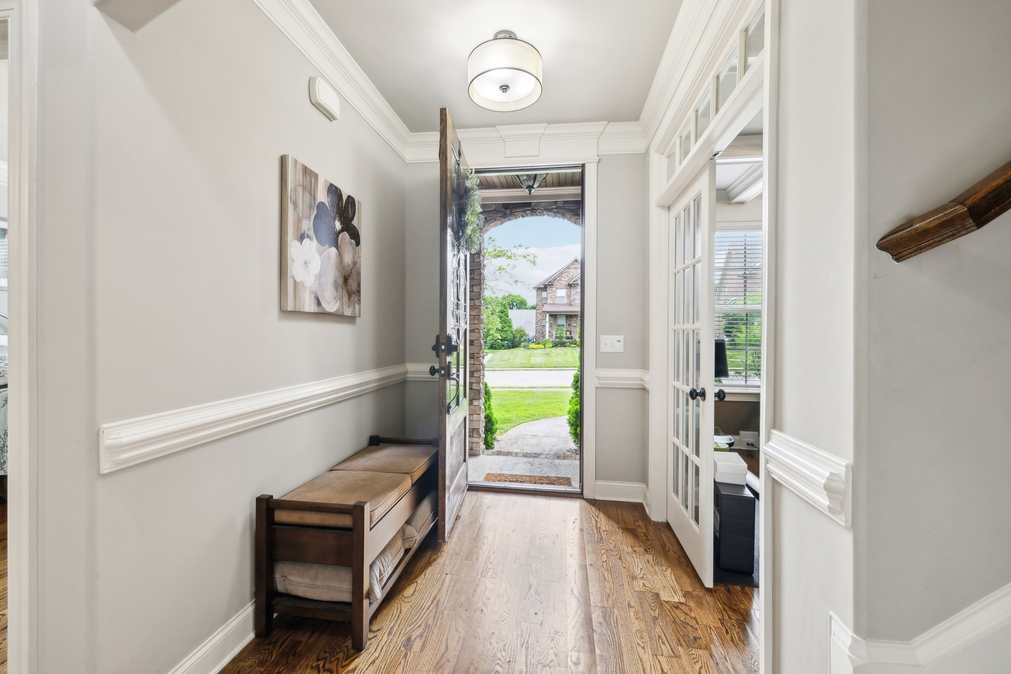 7023 Brindle Ridge Way Spring Hill, TN 37174 - Photo 3 of 26 a view of entryway with wooden floor and fan