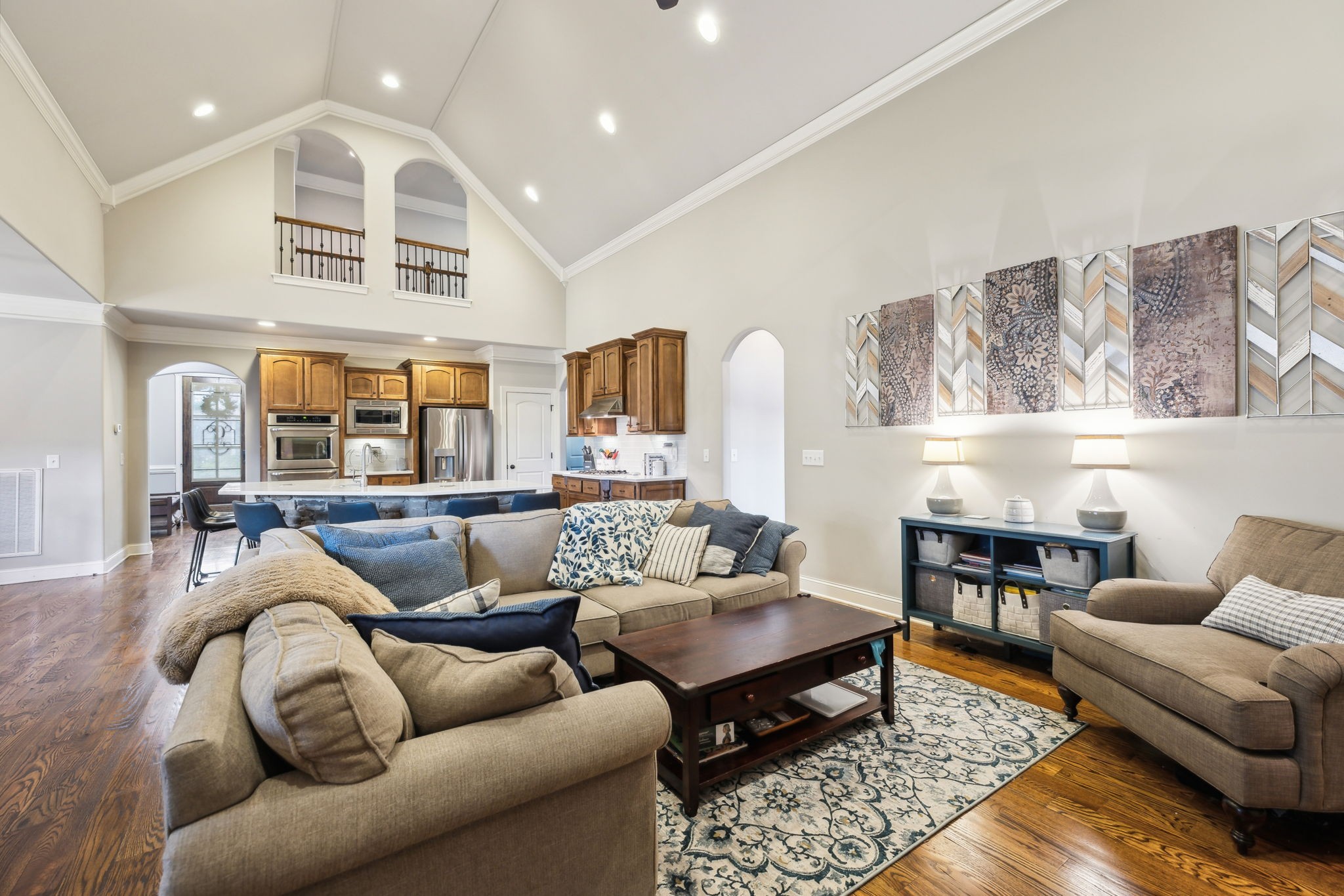 7023 Brindle Ridge Way Spring Hill, TN 37174 - Photo 5 of 26 a living room with furniture wooden floor and kitchen view