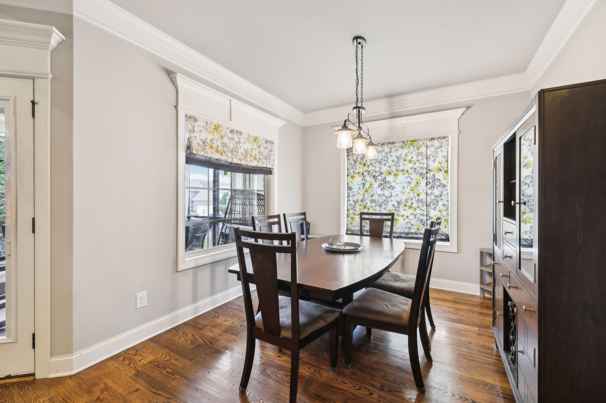 7023 Brindle Ridge Way Spring Hill, TN 37174 - Photo 10 of 26 a view of a dining room with furniture window and wooden floor
